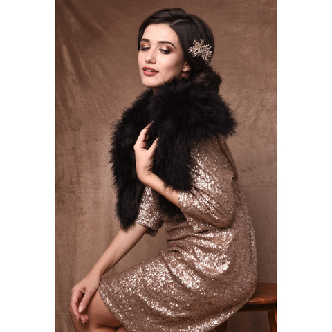 Side view of bride wearing a black marabou feather stole wrap