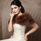 Front view of bride wearing a cocoa marabou feather stole wrap