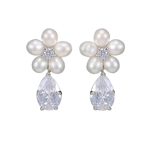 Crystal and pearl earrings made with freshwater pearls and high quality cubic zirconia crystals on a rhodium plated finish, they measure 2.7cm.