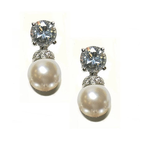 Crystal and pearl earrings made from high quality cubic zirconia clear crystals with ivory pearls on a rhodium plated finish, earrings measure 2.2cm.