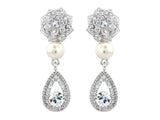 Crystal and pearl earrings made from high quality clear cubic zirconia and Swarovski crystals and a ivory simulated pearl, they have a drop of 4.5cm 