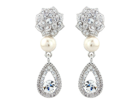 Crystal and pearl earrings made from high quality clear cubic zirconia and Swarovski crystals and a ivory simulated pearl, they have a drop of 4.5cm 