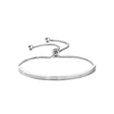 Adjustable crystal bracelet made with clear crystals on a rhodium plated silver tone finish, width 0.5cm. 