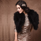 Front view of bride wearing a jet black marabou feather stole wrap
