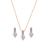 Crystal necklace and earrings set made from clear cubic zirconia crystals on a rhodium plated rose gold finish. 