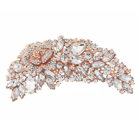 Crystal brooch designed and set with a crystal rose on a rose gold finish, brooch measures 11cm by 5cm.