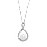 Crystal and pearl necklace made from clear cubic zirconia crystals on a crystal paved rhodium plated finish, the pendant measures 2cm long on a 17cm chain 