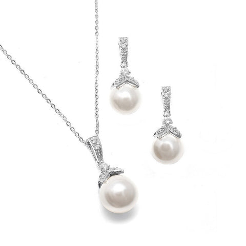 Fully adjustable necklace and earrings set made from clear cubic zirconia crystals on a rhodium plated silver tone finish.