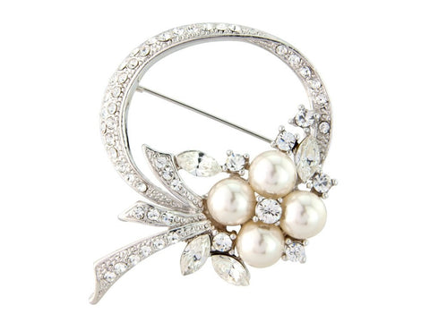 Crystal and pearl brooch made with clear cubic zirconia crystals on a rhodium finish.