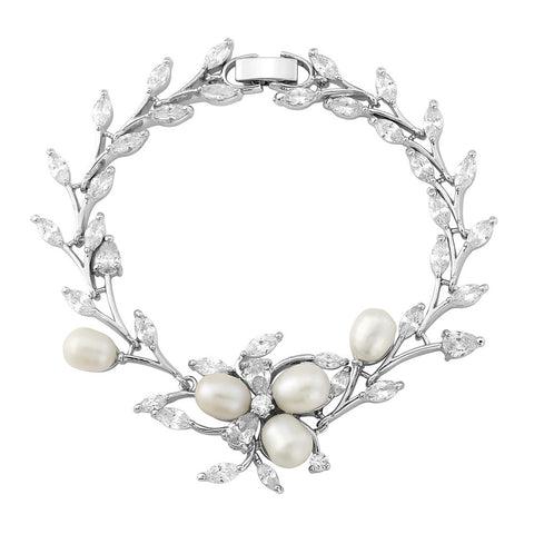 Crystal and pearl bracelet made with clear crystals and freshwater pearls on a rhodium plated silver finish