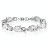 Silver Rhodium Plated Single Row Crystal Bracelet with Teardrop and Round Stones and Clasp Fastening
