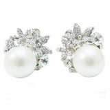 Pearl and crystal earrings with a silver tone setting, pearl measures 10mm
