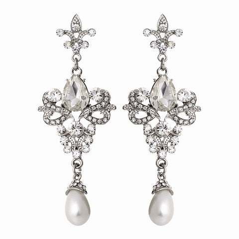 Crystal and pearl earrings made from high quality clear crystals with beautiful simulated ivory pearls on a rhodium plated finish, they have a drop of 7.5cm