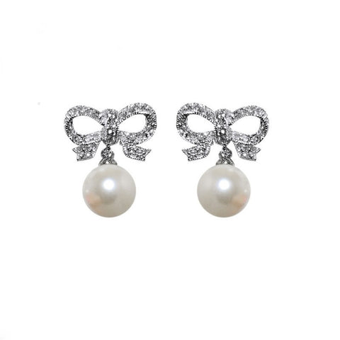 Crystal and pearl earrings in a elegant bow design, earrings have a drop of 2cm.