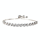 Fully adjustable crystal bracelet on a rhodium plated finish with clear crystals. 