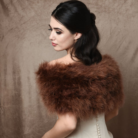 Back view of bride wearing a cocoa brown marabou feather stole wrap acroos her shoulders