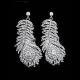 Feather design crystal earrings with an array of clear crystals on a silver tone finish, they have a drop of 7cm
