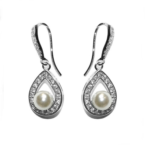 Crystal and pearl drop earrings made from high quality cubic zirconia clear crystals on a rhodium plated finish with pretty simulated ivory pearls, they have a drop of 2.5cm in a hook style