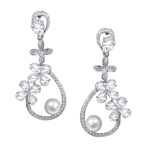 Crystal and pearl earrings made from high quality clear Austrian crystals with ivory simulated pearls, they have a drop of 6cm
