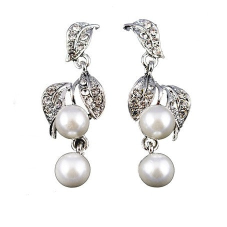 Crystal and pearl drop earrings made from high quality clear crystals and pretty ivory pearls in a leaf design on a sparkly silver tone finish, they have a drop of 3.5cm