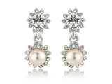 Crystal and pearl earrings made with cubic zirconia and Swarovski crystals married with ivory pearls, they have a drop 2.5cm 