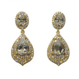 Crystal tear drop earrings made from high quality clear cubic zirconia crystals on a rhodium plated gold tone finish, they have a drop of 6cm. 