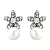 Crystal flower and pearl earrings made from high quality cubic zirconia crystals on a rhodium plated finish, they measure 2cm by 1cm