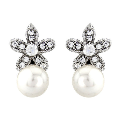 Crystal flower and pearl earrings made from high quality cubic zirconia crystals on a rhodium plated finish, they measure 2cm by 1cm