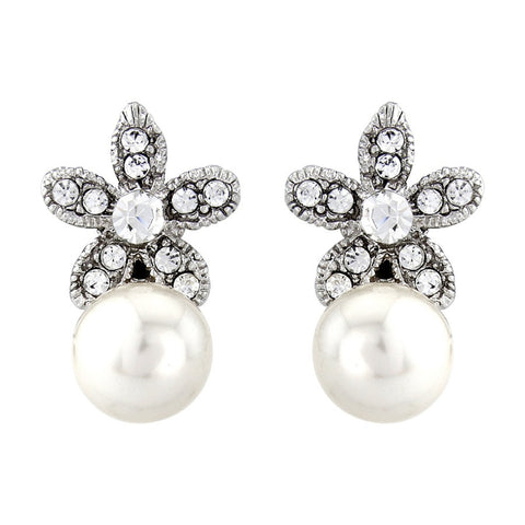 Crystal flower and pearl earrings made from high quality cubic zirconia crystals on a rhodium plated finish, they measure 2cm by 1cm