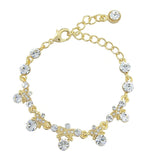 Crystal bow bracelet made with high quality clear cubic zirconia crystals on a gold tone finish
