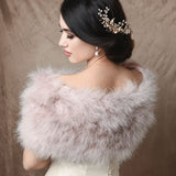 Back view of bride wearing a lavendar marabou feather stole wrap acroos her shoulders
