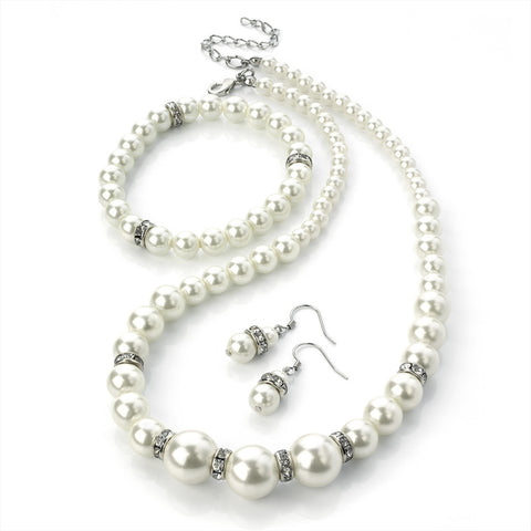 Ivory pearl necklace, earrings and bracelet set, necklace measures 42cm long, the earrings have a drop of 1.5cm and the bracelet is elasticated