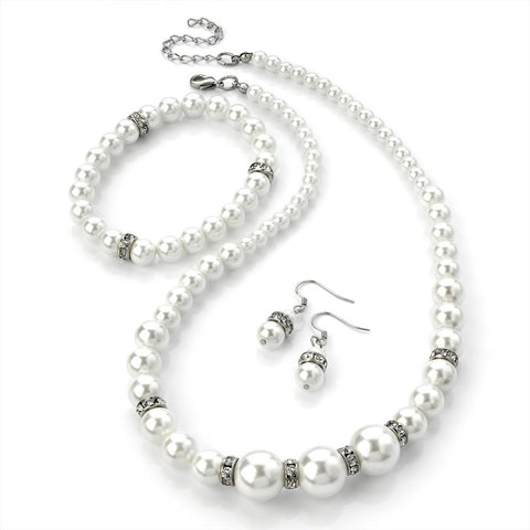 White pearl necklace, earrings and bracelet set, the necklace measures 42cm long, the earrings have a drop of 1.5cm and the necklace is fully elasticated 
