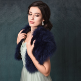 Side view of bride wearing a navy blue marabou feather stole wrap