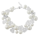 Crystal and pearl bracelet with ivory pearls and clear crystals on a silver plated finish, width is 2cm