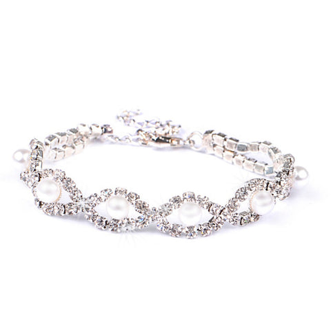 Lobster clasp bracelet made with cubic zirconia clear crystals and simulated ivory pearls, width 1cm. 