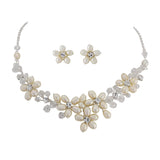 Pearl and crystal necklace and earrings set made with freshwater pearls and clear cubic zirconia crystals on a silver plated finish, the earrings measure 1cm by 1cm