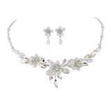 Crystal and pearl necklace and earrings set made with frosted Swarovski crystals and ivory pearls on a high quality silver plated finish, the necklace is adjustable and the earrings have a drop of 1.5cm