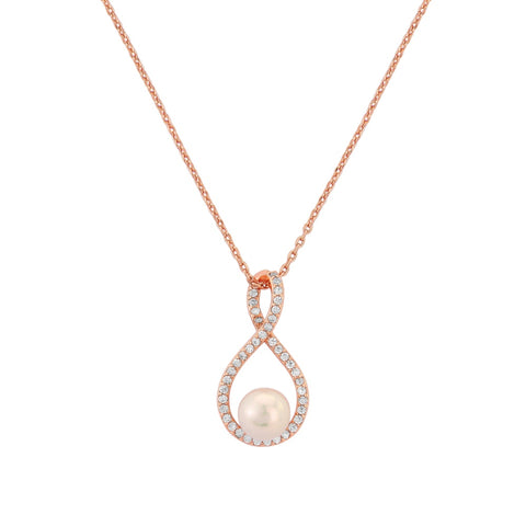 Crystal and pearl necklace made from clear cubic zirconia crystals on a crystal paved rhodium plated finish, the pendant measures 2cm long on a 17cm chain