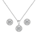 Crystal necklace and earrings set made with clear cubic zirconia crystals on a silver plated finish, the necklace is adjustable and the earrings measure 1cm by 1cm 