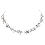 Fully adjustable necklace made with clear crystals on a silver tone finish. 