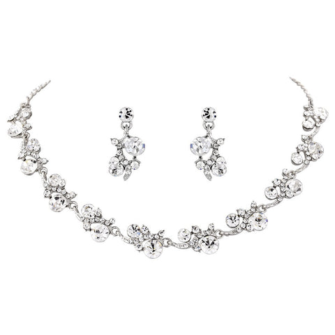 Fully adjustable necklace and earrings set made from clear crystals on a silver tone finish, the earrings measure 2cm long. 