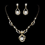 Crystal necklace and earrings set made from clear crystals on gold tone finish, the necklace is fully adjustable and the earrings measure 3.5cm long. 