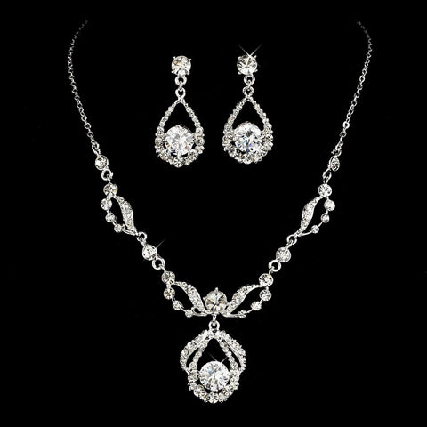 Crystal necklace and matching earrings set made from clear crystals on a silver tone finish, the necklace is fully adjustable and the earrings measure 3.5cm long. 