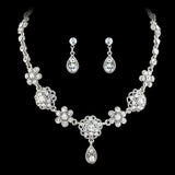 Crystal necklace and earrings set made with clear crystals on a silver tone finish, the necklace is fully adjustable