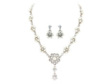 Crystal and pearl necklace set made from clear Swarovski and cubic zirconia crystals on a silver tone finish, the necklace is fully adjustable and the earrings measure 2cm long. 