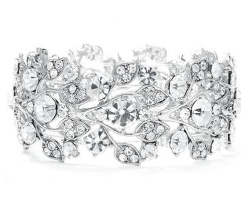 Elasticated crystal flower bracelet made with clear crystals on a silver tone finish. 