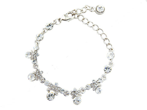 Crystal bow bracelet made with high quality clear cubic zirconia crystals on a silver tone finish