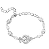 Fully adjustable crystal bracelet made with clear cubic zirconia and swarovski crystals on a rhodium plated silver finish. 