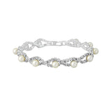 Lobster clasp bracelet made with cubic zirconia crystals and simulated ivory pearls. 